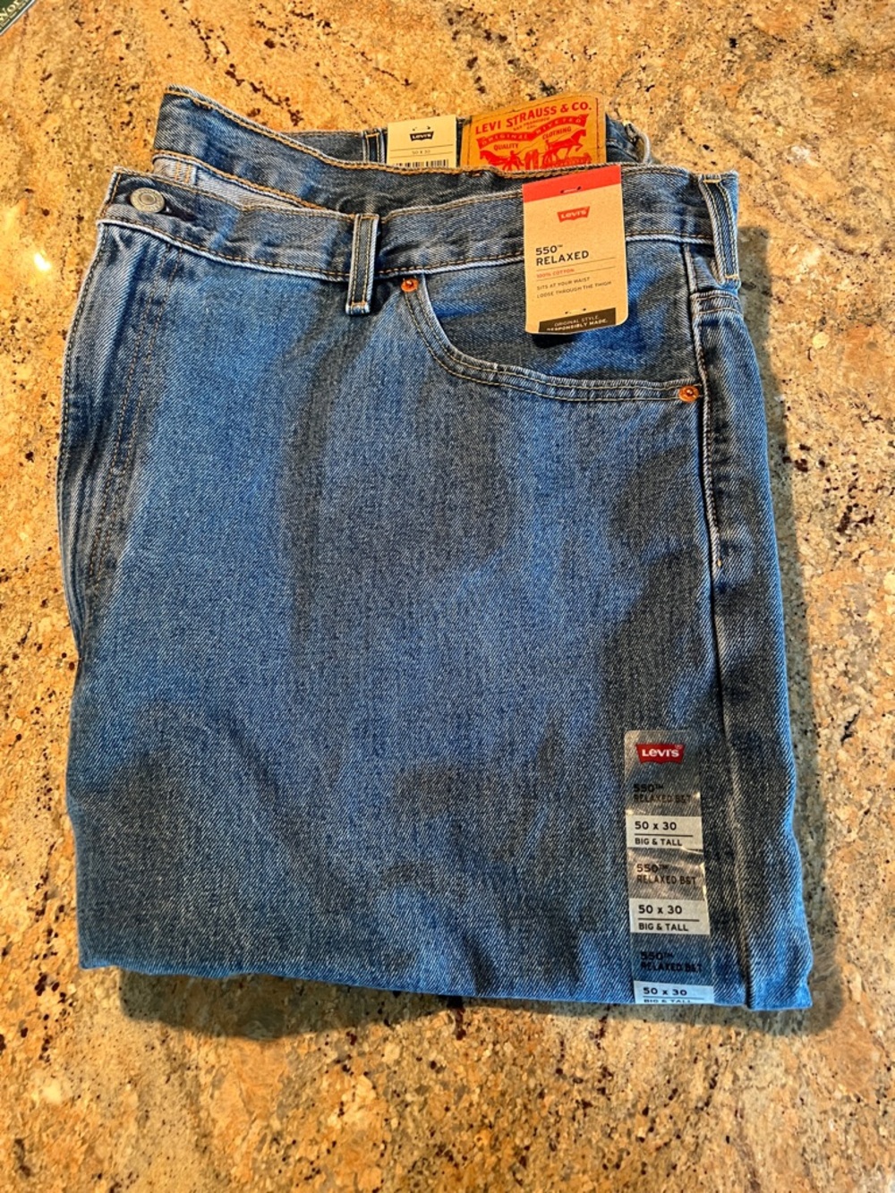 Levi's 550 Relaxed Fit Men's Jeans in Medium Blue, 50x30 big and tall.